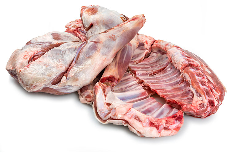 The butchered cuts of a goat artfully piled onto each other